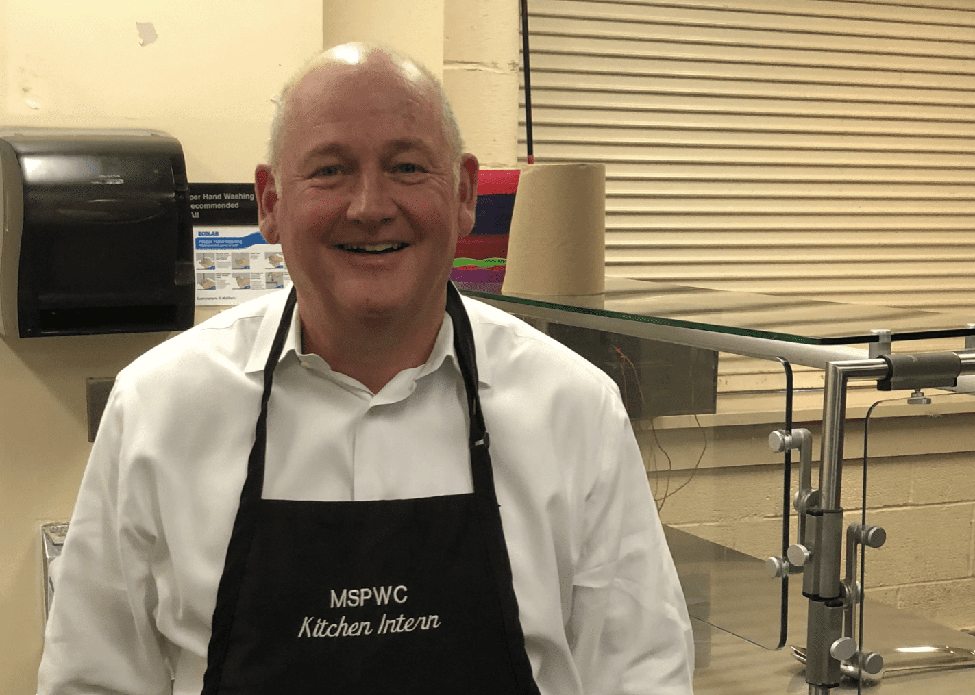 Managing partner Charlie Maskell volunteering as a kitchen intern.